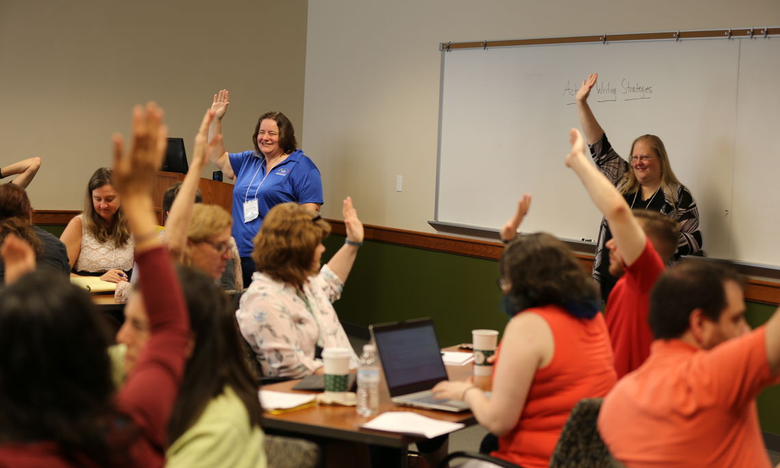 Another POGIL tradition - raising your hand to quiet the room.